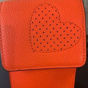 🍊💥🤎🤍🤎HENRI BENDEL - Tangerine perorated heart  phone case/lariat bag.